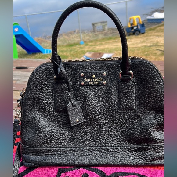 Kate Spade purse in great condition. The color is black. It has a strap. - Picture 3 of 3